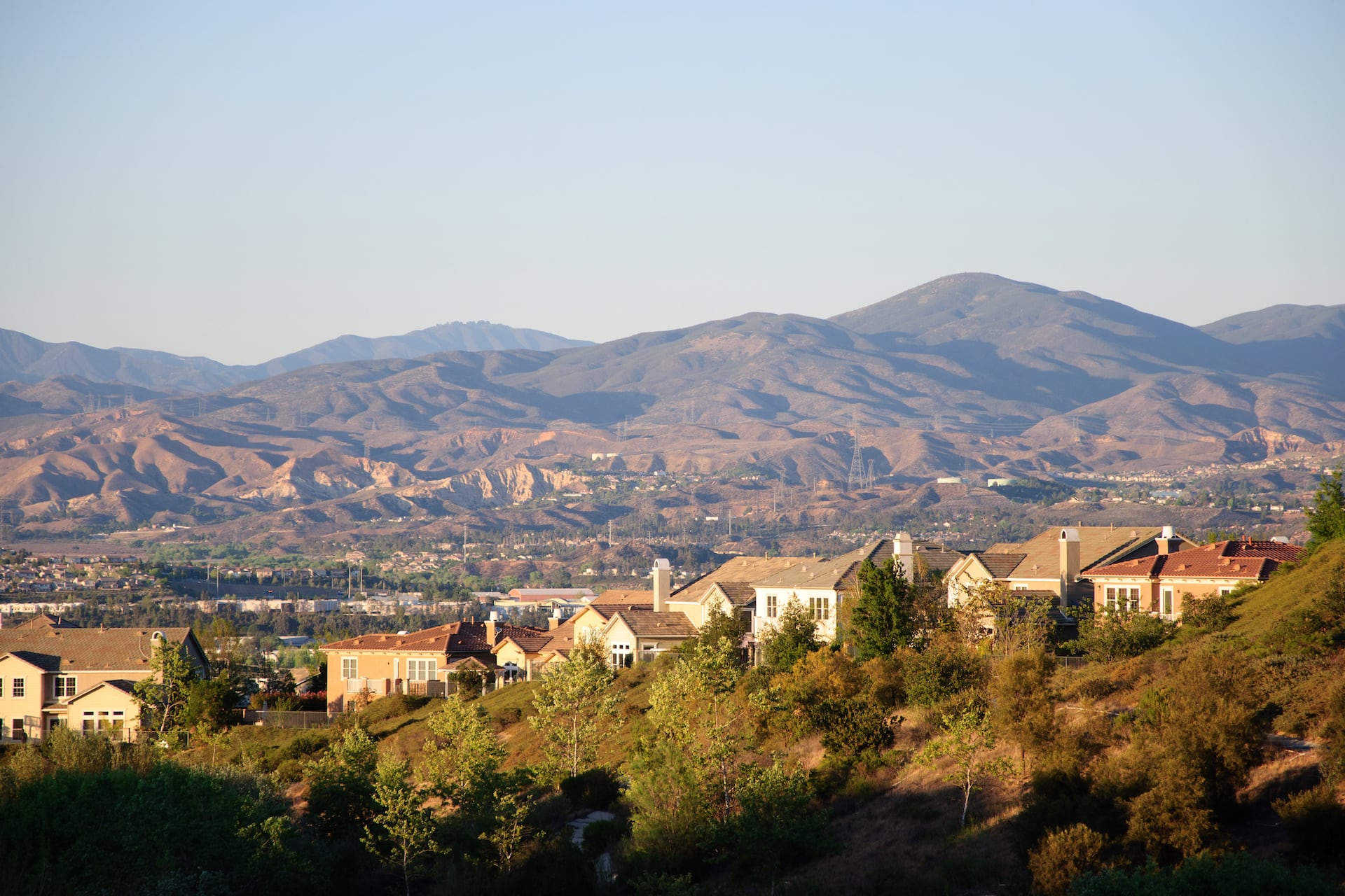 View of houses with mountains behind in Santa Clarita, California